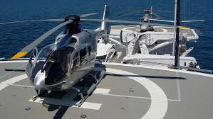 Santorini yacht + helicopter VIP service